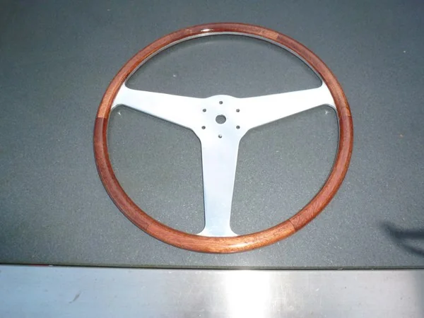 Bizzarrini handcrafted mahogany steering wheel recreated using segmented construction