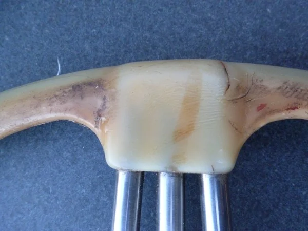 Citroën Traction Avant rim to spoke transition detail before restoration