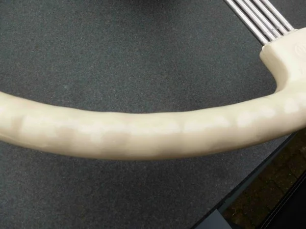 Delahaye steering wheel rear with finger cutouts identical to original pattern