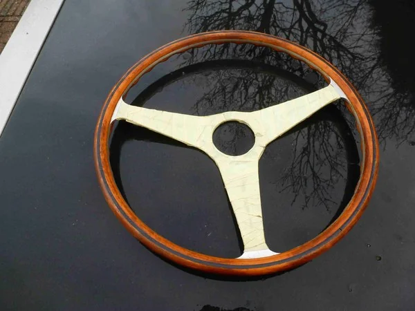 Ferrari 365 GTB Nardi steering wheel for restoration with deteriorated clear coat and loose wood
