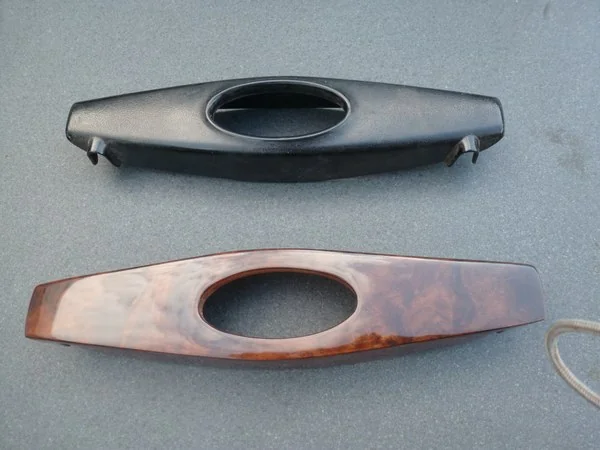 Jaguar XJ6 wooden horn cover recreation shown next to original example