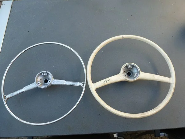 Mercedes 190 SL original steering wheel compared with version stripped of bakelite