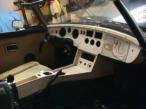 MGB dashboard and center console built from layered aviation plywood