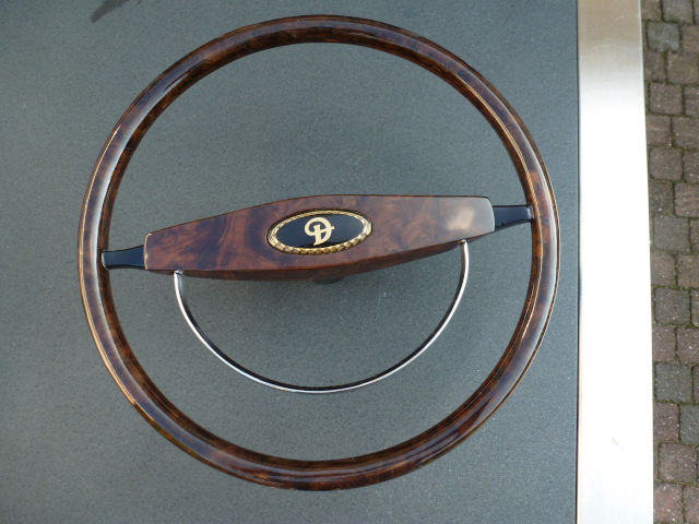 Bakelite center piece and spokes replaced by epoxy