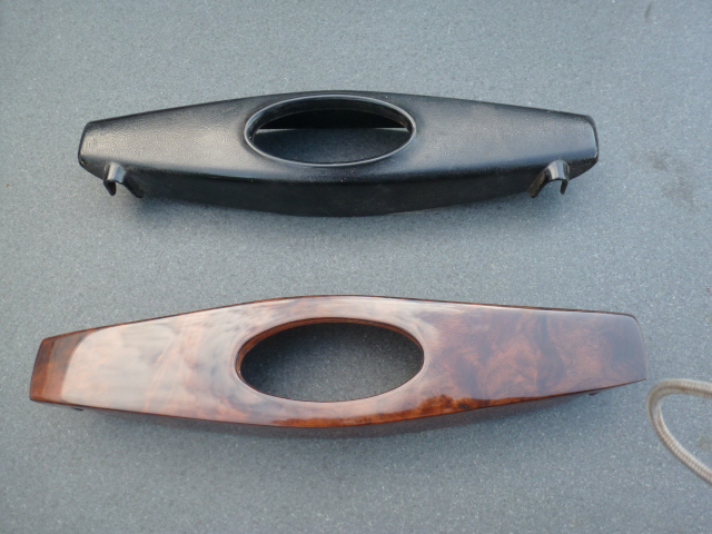 The wooden horn cover recreation next to the original. Loose wooden horn caps are available